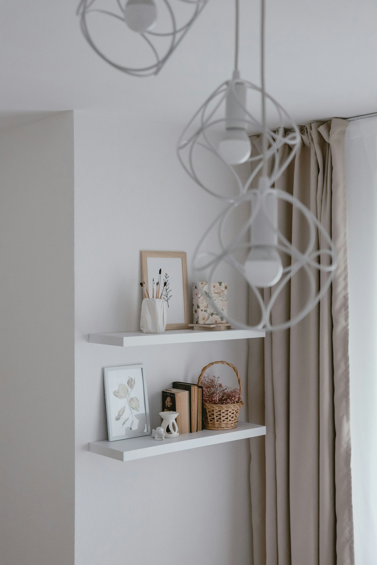 An organized shelf with books and decor